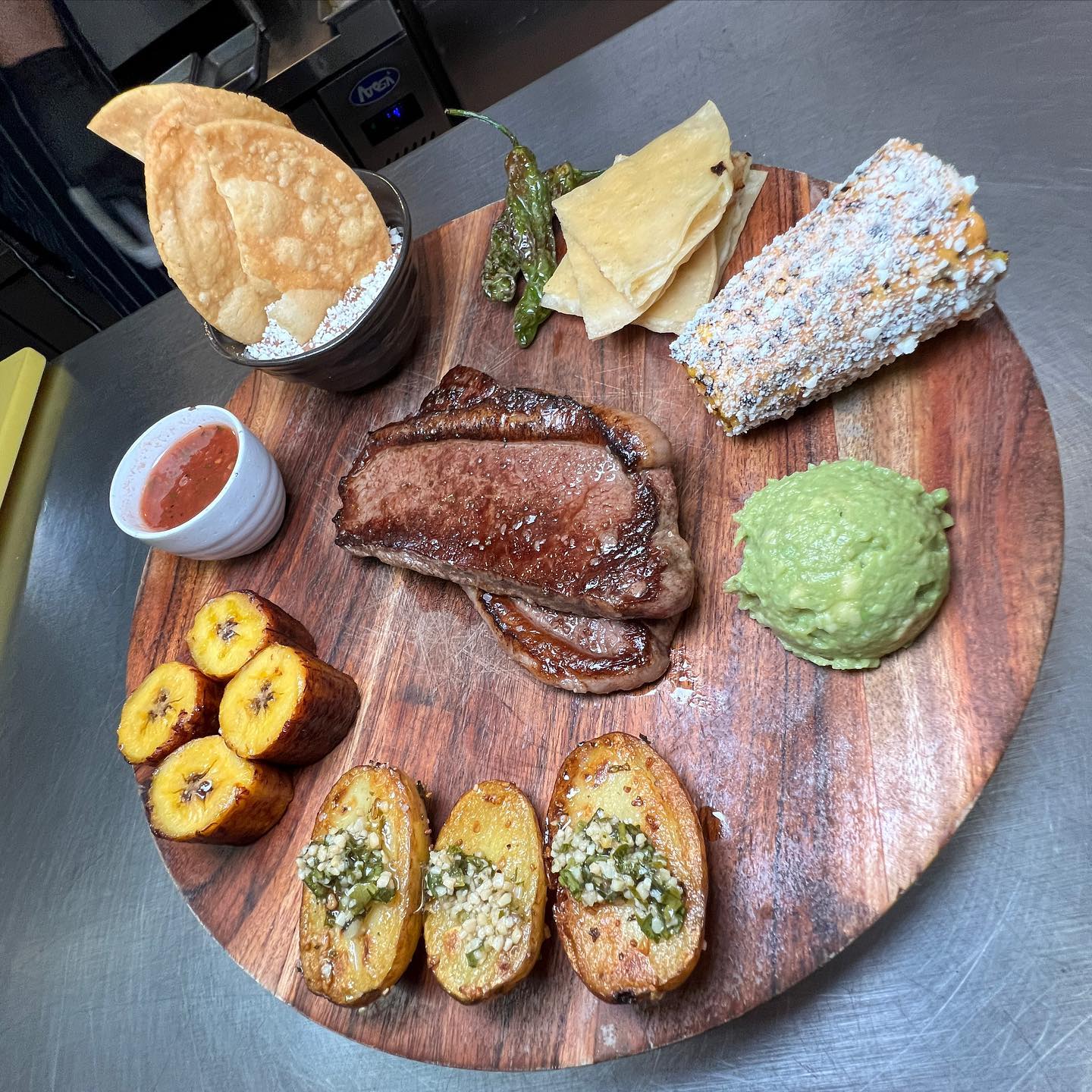 close-up of meat and appetizers at aroma latin cocina 