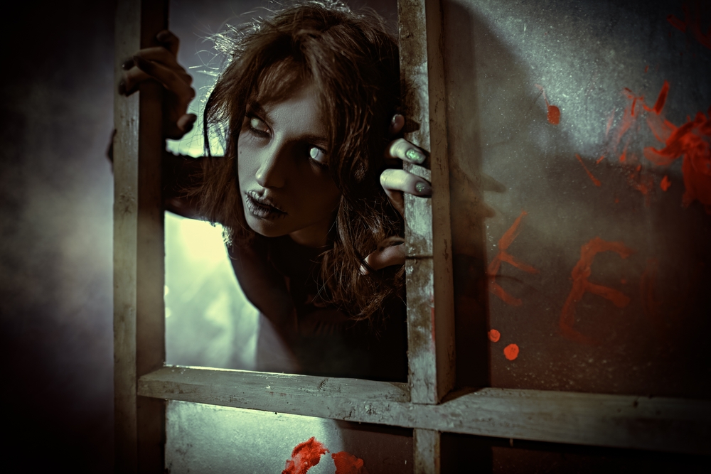 ghost girls looks out window