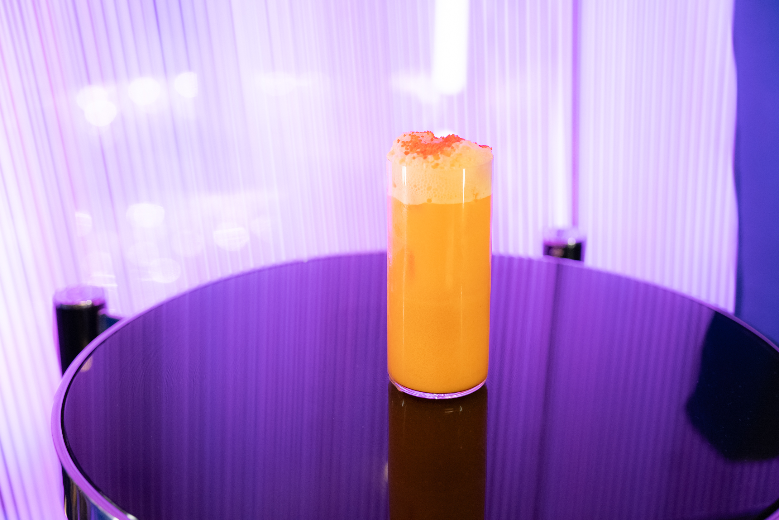 Image of the Mr. Orangesicles Nippy Mood mocktail at The Chandelier at The Cosmopolitan of Las Vegas