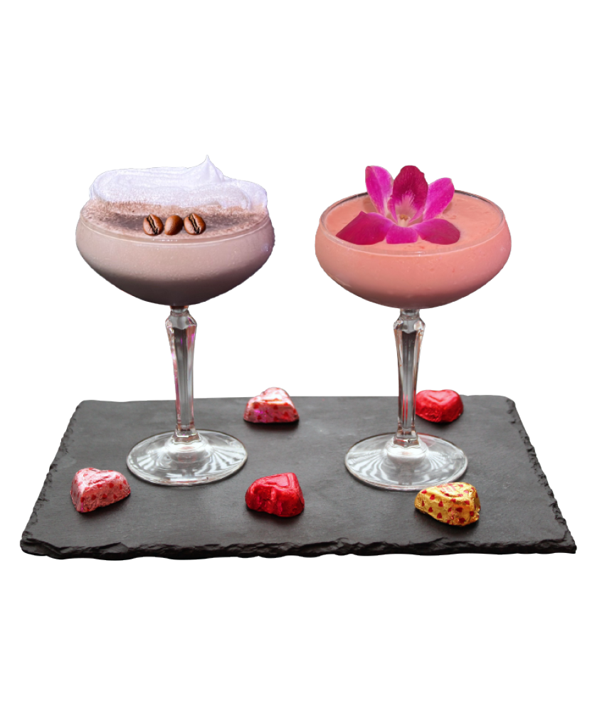 Image of two espresso martini cocktails with Godiva chocolates from Sugar Factory's Valentine's Day themed seasonal memu