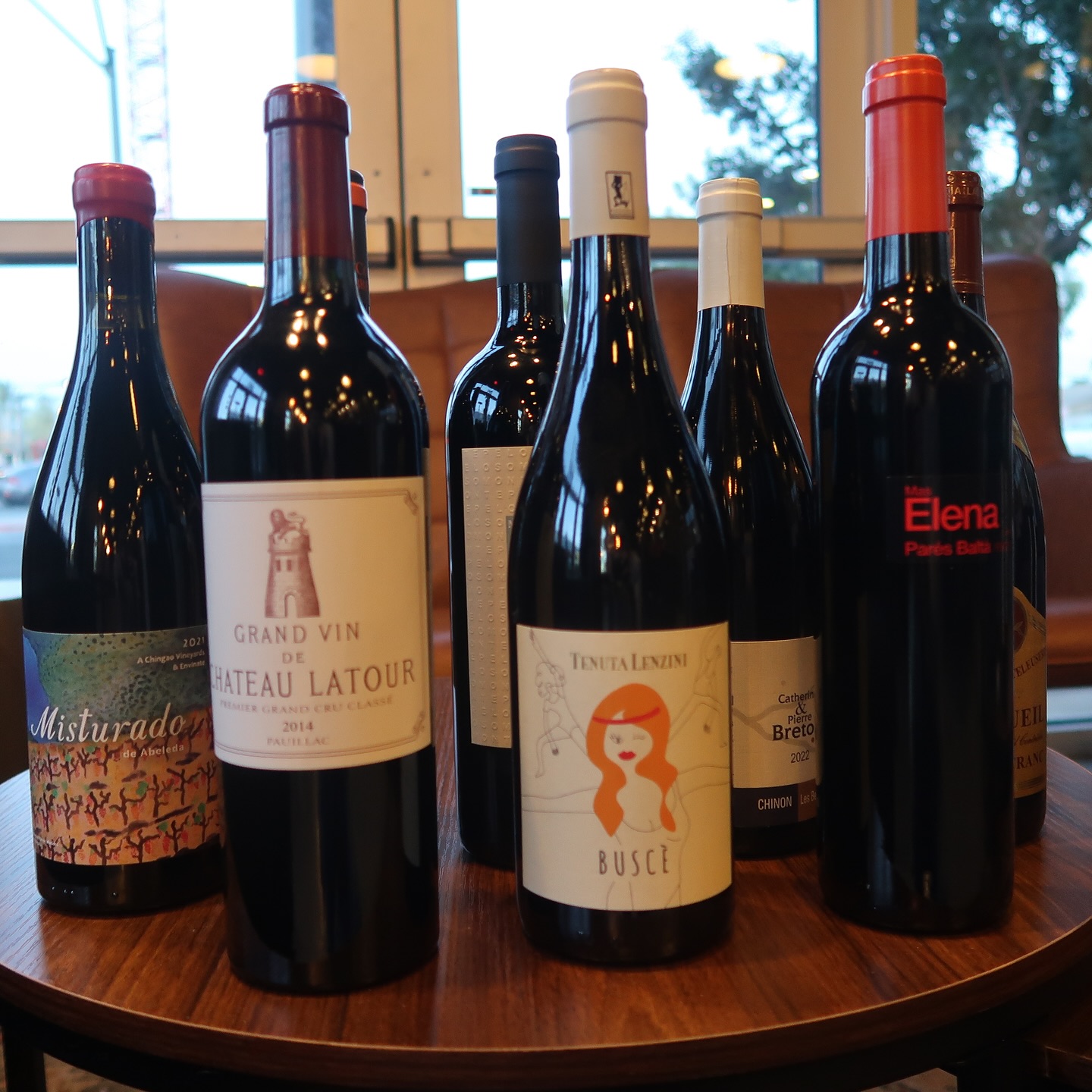 wine bottles on a table 